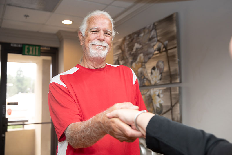Patient Shaking Team members hand